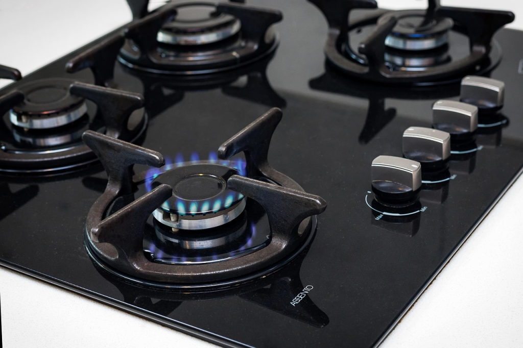 Clean gas stove top 
